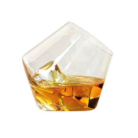 Handblown tilt whiskey glass made of borosilicate, modern angled design for whiskey and cocktails